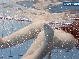 first-timer Lastova proceeds her swim