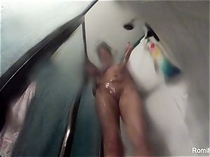 pornographic star Romi Rain brings her camera in the bathroom
