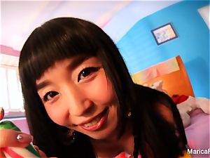 chinese starlet Marica Hase plays with candy hard-on