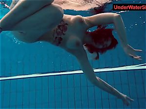 tatted baby swirls underwater